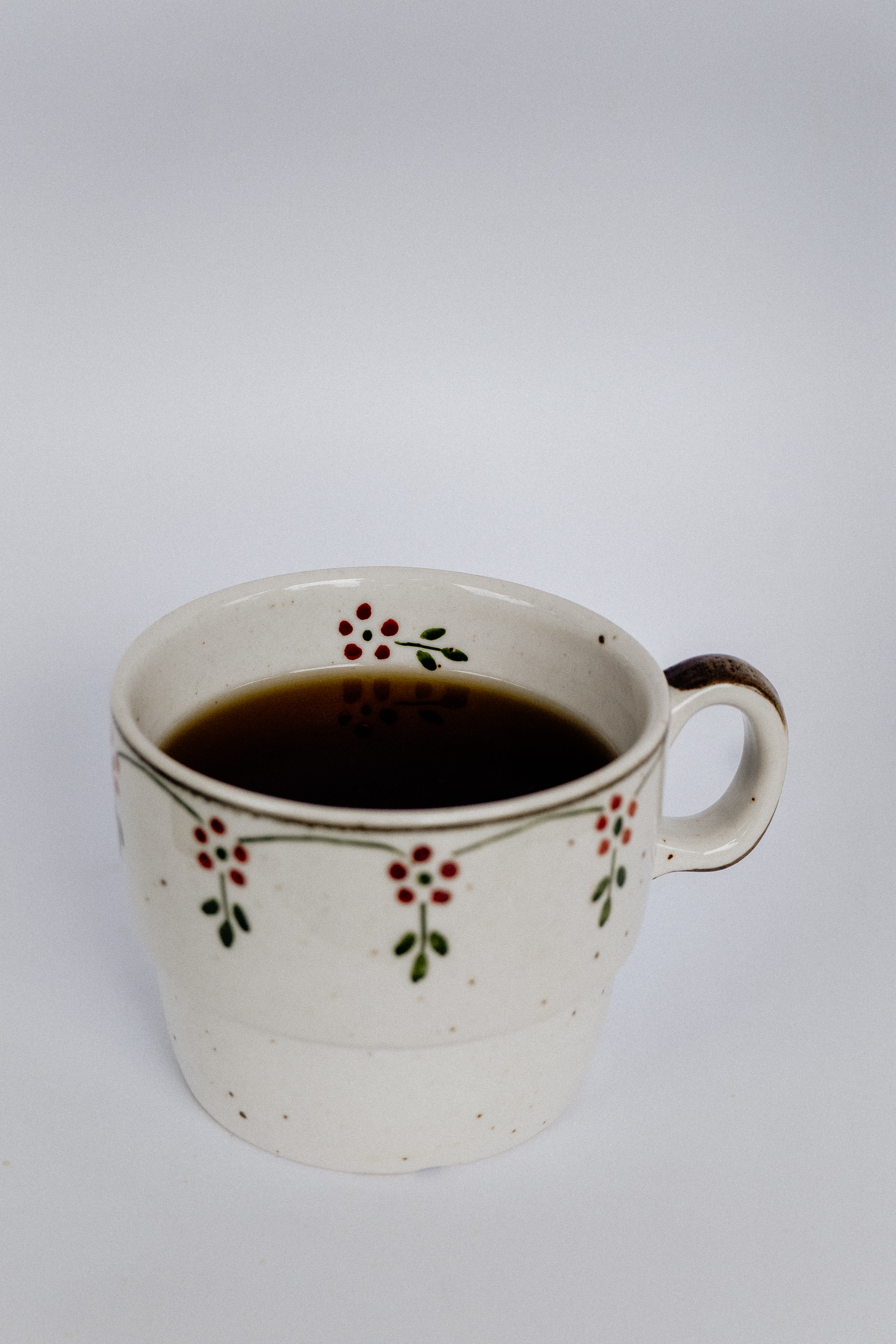 Coffee in a handmade floral mug