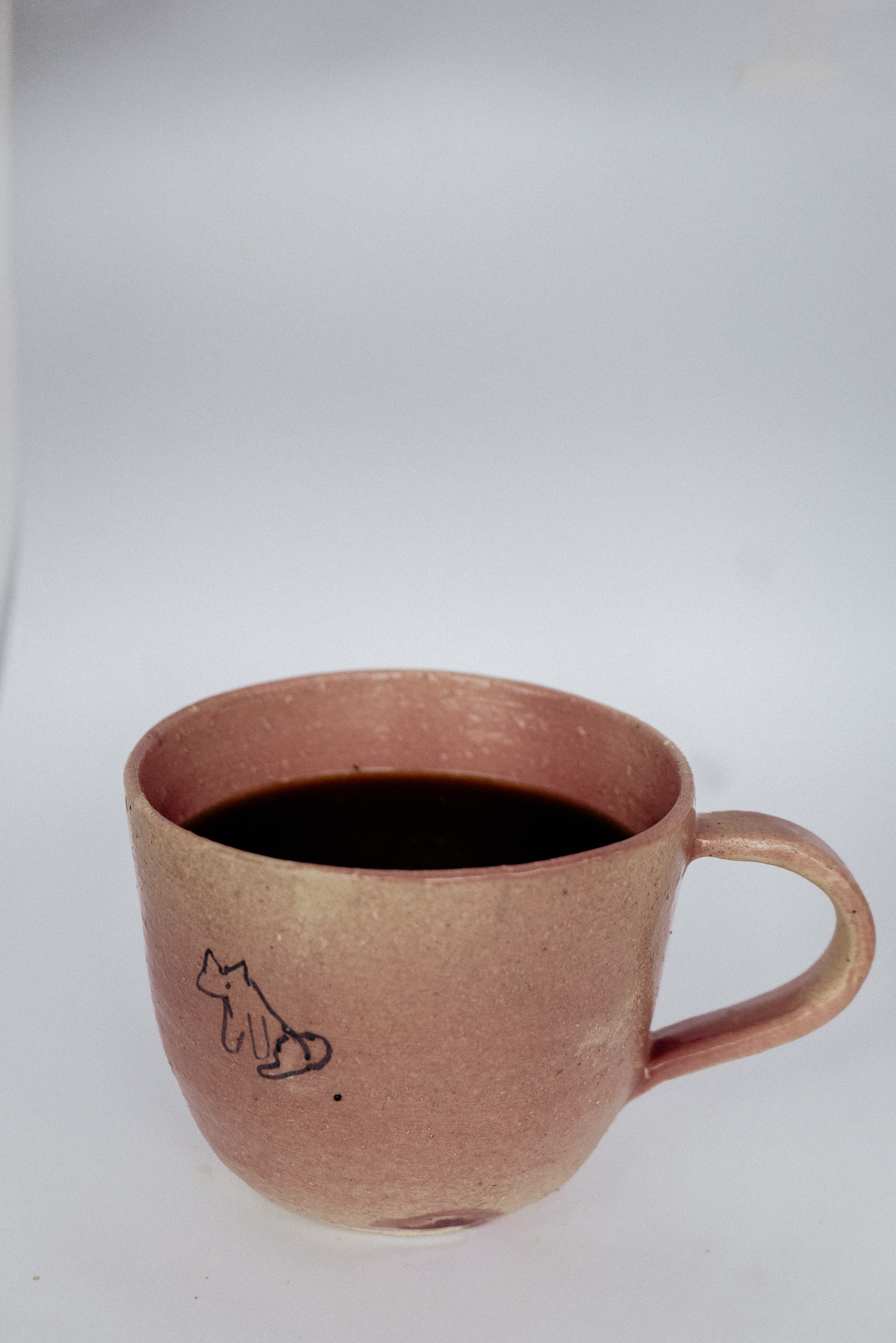 Coffee in a handmade ceramic mug